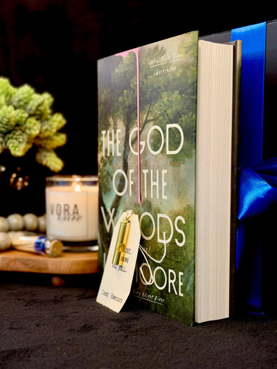 The God of the Woods — the novel with its keepsake