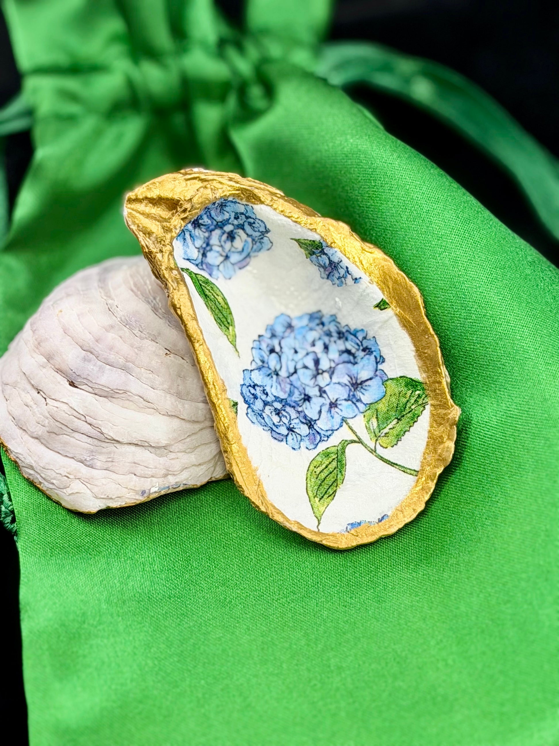 Evelyn Hugo keepsake — oyster shell dish in emerald silk bag